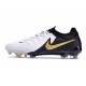 Bota Nike Phantom Luna 2 Elite FG Blanco Negro Mtlc Dorado Moneda