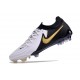 Bota Nike Phantom Luna 2 Elite FG Blanco Negro Mtlc Dorado Moneda