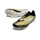 Bota Adidas F50 + Sin Cordones FG X Messi Dorado Met Negro Blanco