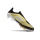 Bota Adidas F50 + Sin Cordones FG X Messi Dorado Met Negro Blanco