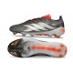 Bota adidas Predator 26 Elite FG Hierro Met. Ftwr Blanco Rojo Lúcido