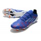 Bota de Futbol adidas X Speedflow.1 FG Azul Blanco Vivid Red